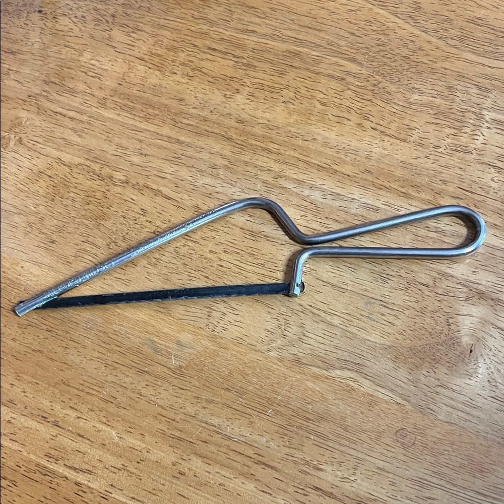 Stainless Steel Wire Cheese Slicer or Mini Hacksaw. ??